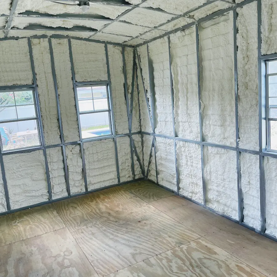 Closed-cell spray foam insulation applied to wall cavities in a residential project in Hooksett